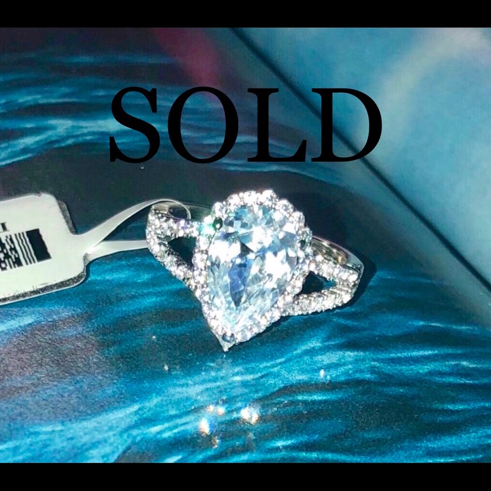 Pear Shaped Halo Diamond Engagement Ring
